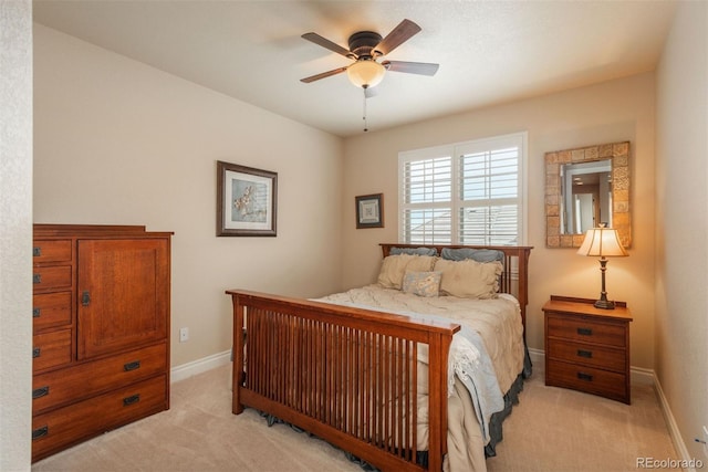 9165 Kornbrust Dr, Lone Tree, CO 80124 - bedroom with light carpet, baseboards, and a ceiling fan