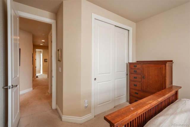 9165 Kornbrust Dr, Lone Tree, CO 80124 - bedroom with light colored carpet, baseboards, a closet, and recessed lighting