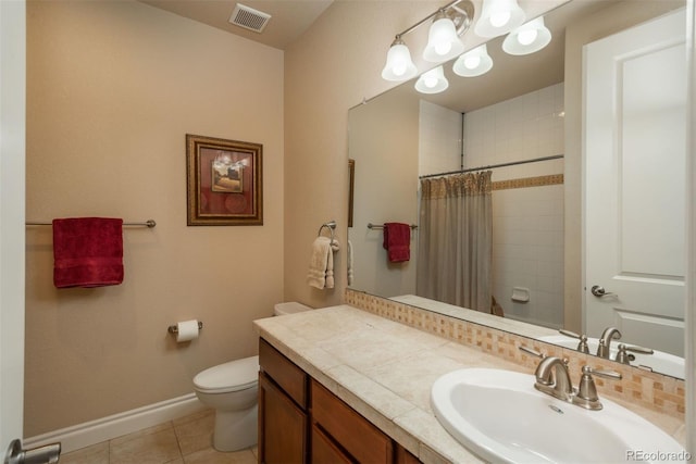 9165 Kornbrust Dr, Lone Tree, CO 80124 - bathroom featuring toilet, tile patterned flooring, baseboards, vanity, and tiled shower