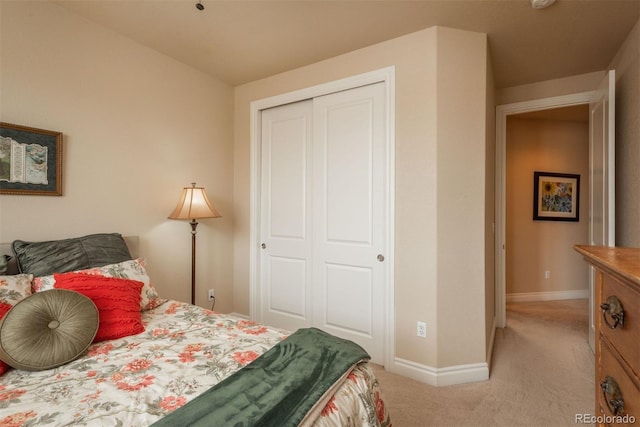 9165 Kornbrust Dr, Lone Tree, CO 80124 - bedroom with a closet, light carpet, and baseboards
