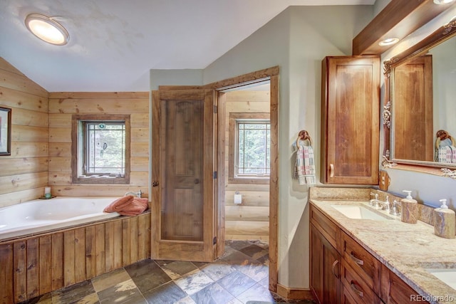 1198 Kootchie Kootchie Rd, Alma, CO 80420 - bathroom featuring lofted ceiling, tile floors, wooden walls, dual vanity, and a bathing tub