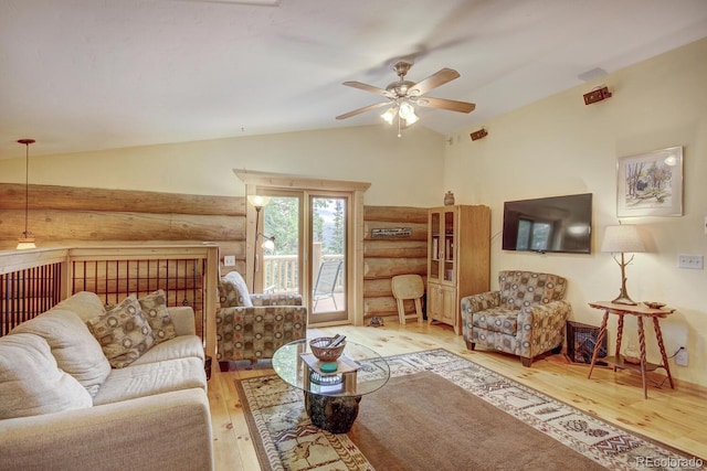 1198 Kootchie Kootchie Rd, Alma, CO 80420 - living room with lofted ceiling, ceiling fan, log walls, and hardwood / wood-style floors