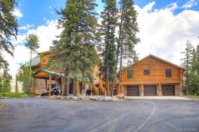 1198 Kootchie Kootchie Rd, Alma, CO 80420 - log cabin featuring a garage