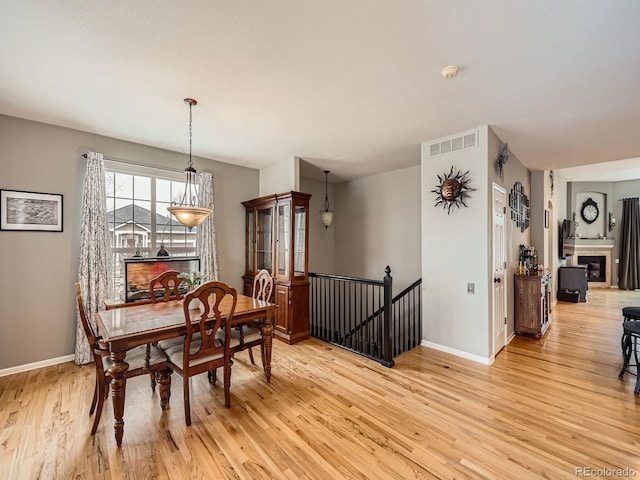 dining room featuring light hardwood / wood-style floors