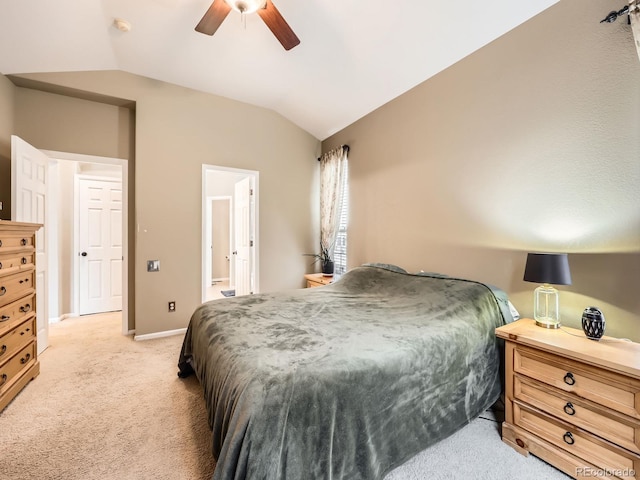 bedroom featuring lofted ceiling, light carpet, and ceiling fan