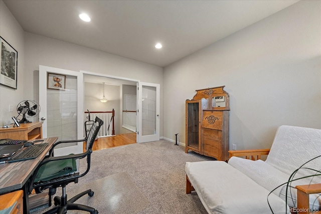 office space with french doors and hardwood / wood-style flooring