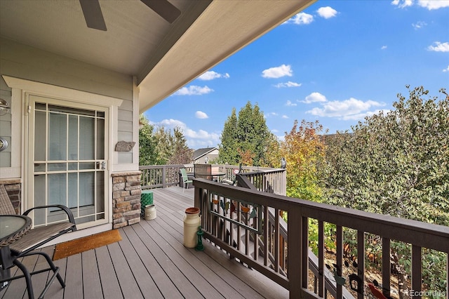 wooden deck with ceiling fan