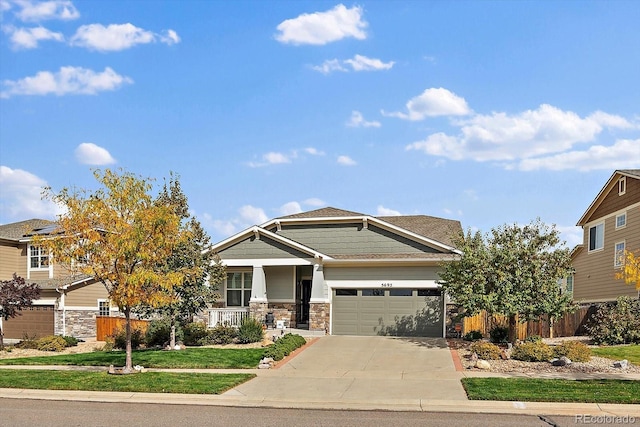 view of front of home featuring covered porch and a front lawn