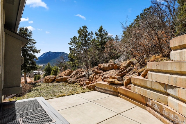 view of patio featuring a mountain view