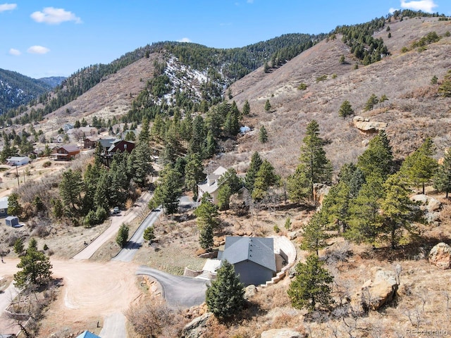 drone / aerial view featuring a mountain view