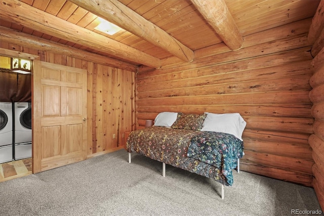 carpeted bedroom featuring washer and dryer, beamed ceiling, and wooden ceiling