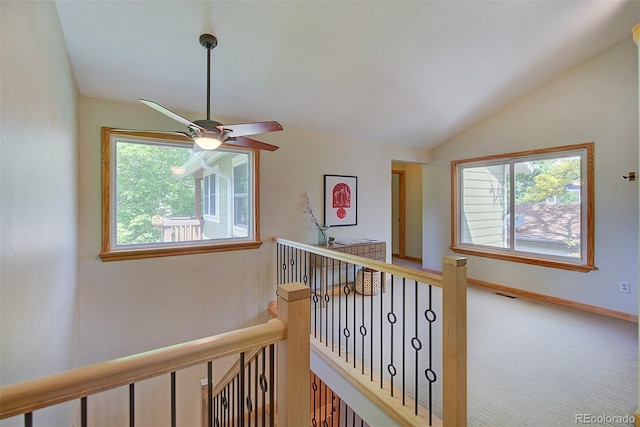 3966 Bosque Ct, Boulder, CO 80301 - hallway featuring vaulted ceiling, carpet, an upstairs landing, and baseboards