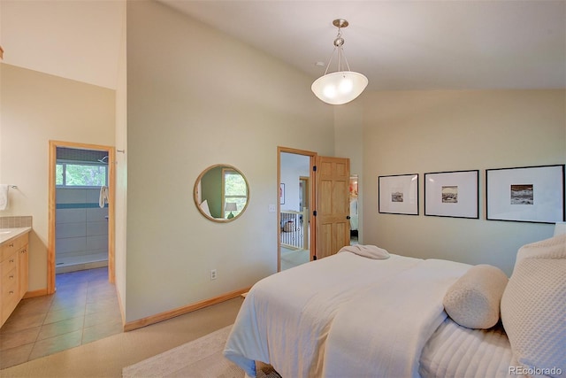 3966 Bosque Ct, Boulder, CO 80301 - bedroom featuring high vaulted ceiling, baseboards, light tile patterned floors, and light colored carpet