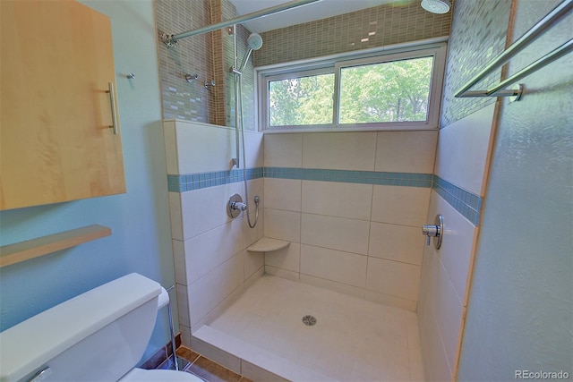 3966 Bosque Ct, Boulder, CO 80301 - bathroom featuring toilet and tiled shower