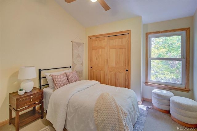 3966 Bosque Ct, Boulder, CO 80301 - carpeted bedroom featuring a closet, baseboards, lofted ceiling, and a ceiling fan