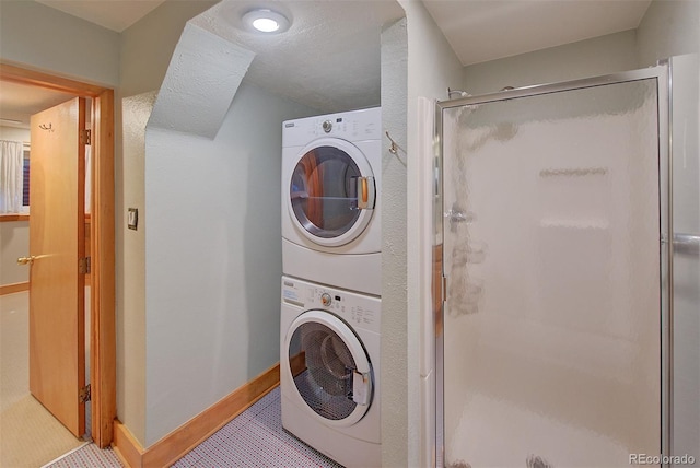 3966 Bosque Ct, Boulder, CO 80301 - laundry room with stacked washer / drying machine and baseboards