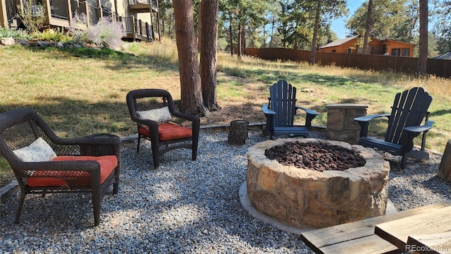 view of yard featuring a fire pit