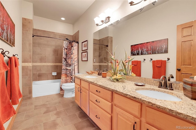 full bathroom featuring tile patterned flooring, vanity, shower / bath combination with curtain, and toilet