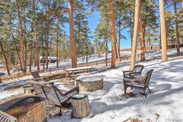 view of snow covered patio