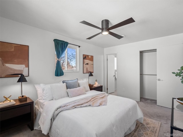 carpeted bedroom featuring ceiling fan