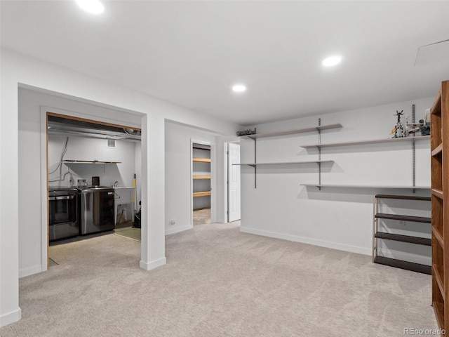 finished basement with recessed lighting, carpet flooring, independent washer and dryer, and baseboards