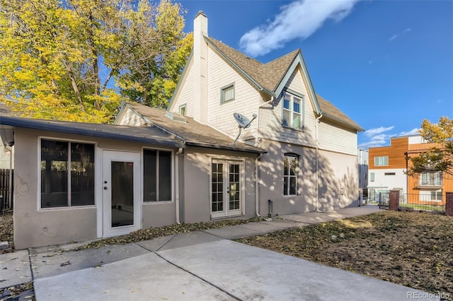 rear view of house featuring a patio area