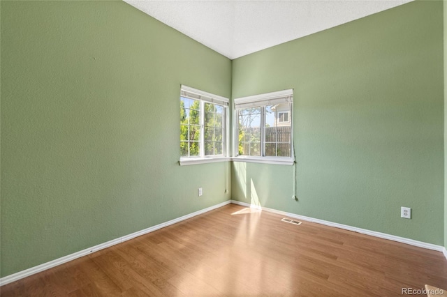 19937 E Loyola Pl, Aurora, CO 80013 - unfurnished room featuring wood finished floors