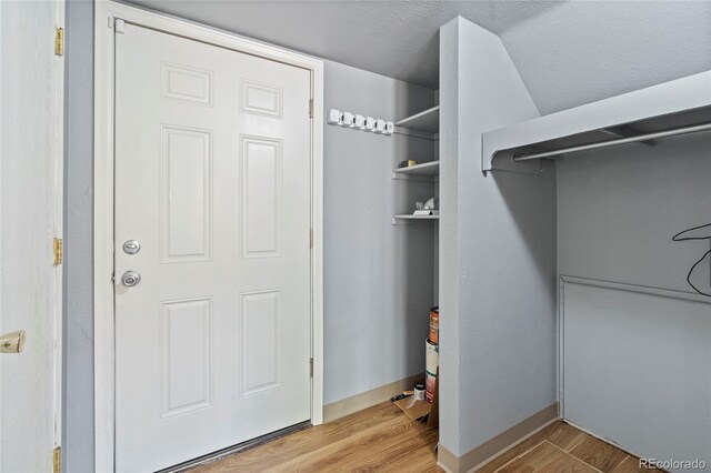 19937 E Loyola Pl, Aurora, CO 80013 - walk in closet with wood finished floors