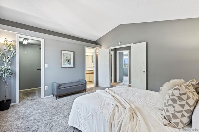 19937 E Loyola Pl, Aurora, CO 80013 - carpeted bedroom featuring lofted ceiling, a spacious closet, and ensuite bathroom
