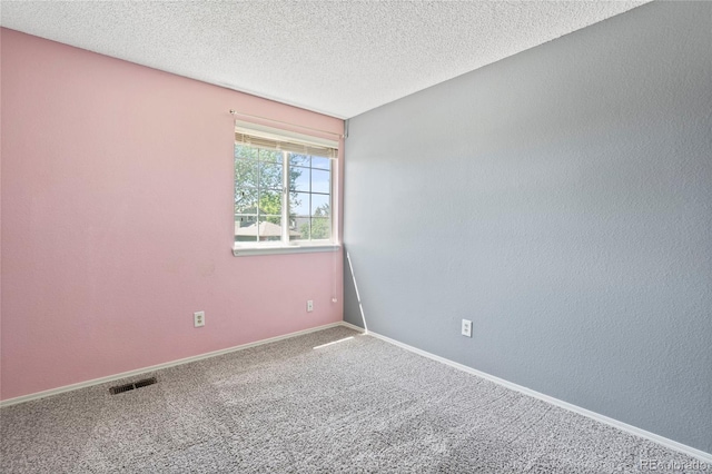 19937 E Loyola Pl, Aurora, CO 80013 - carpeted spare room with a textured ceiling and baseboards