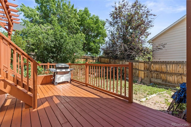 19937 E Loyola Pl, Aurora, CO 80013 - wooden terrace featuring a fenced backyard and area for grilling