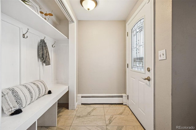 mudroom with marble finish floor and a baseboard radiator