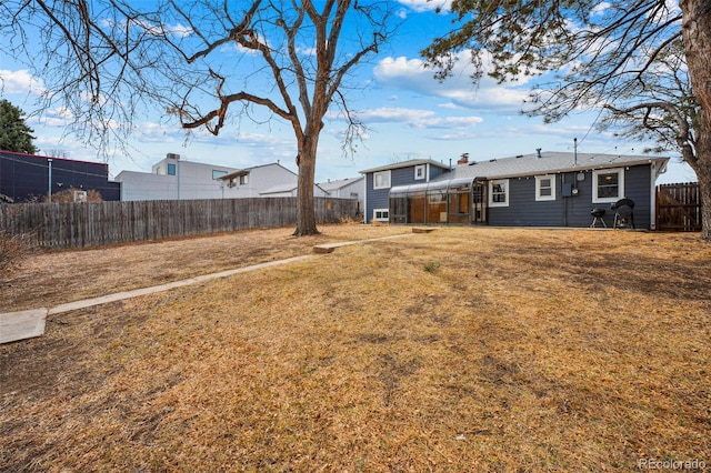 view of yard featuring a fenced backyard