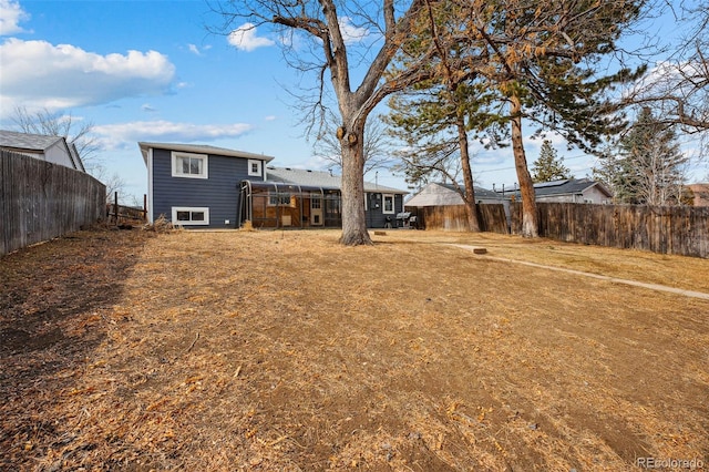 view of yard with a fenced backyard