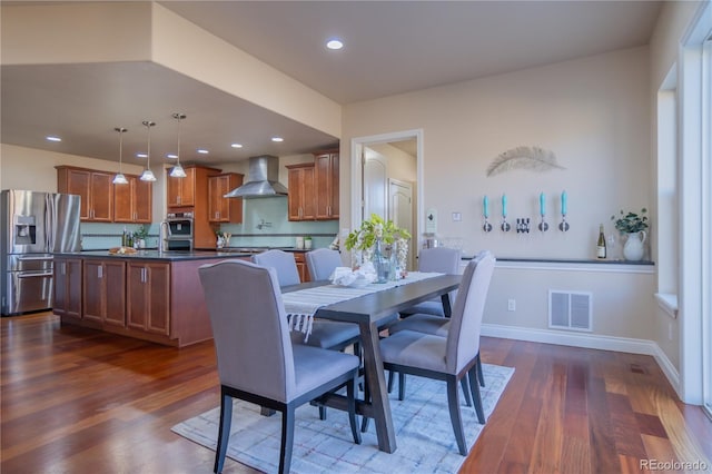 dining room featuring dark hardwood / wood-style floors