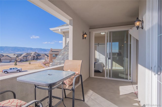 balcony featuring a mountain view