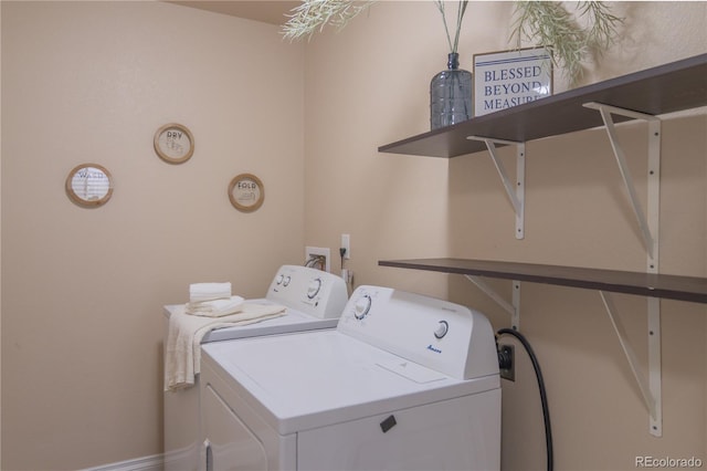 laundry area featuring independent washer and dryer