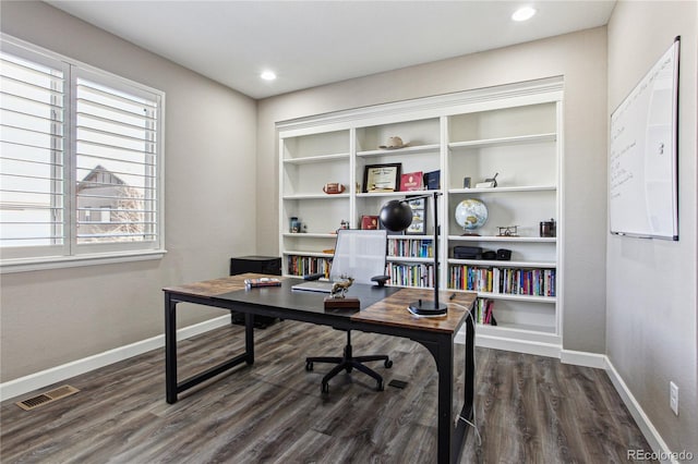 office space with recessed lighting, visible vents, dark wood finished floors, and baseboards