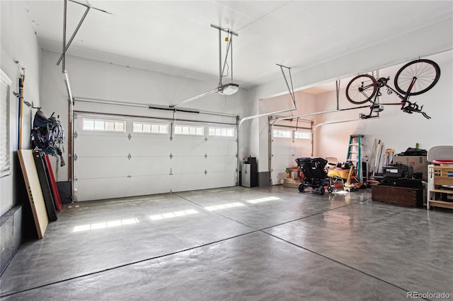 garage featuring a garage door opener