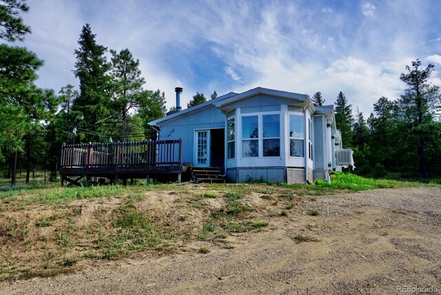 exterior space featuring a deck