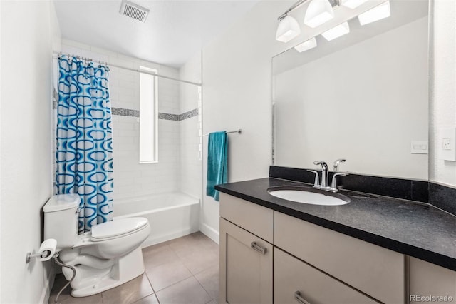 2564 S Carey Way, Denver, CO 80222 - full bath featuring tile patterned floors, toilet, vanity, and shower / bath combo