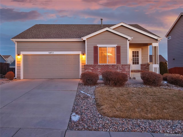 ranch-style home with a garage