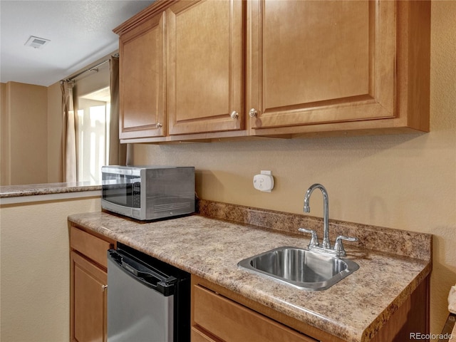 kitchen featuring sink and stainless steel appliances