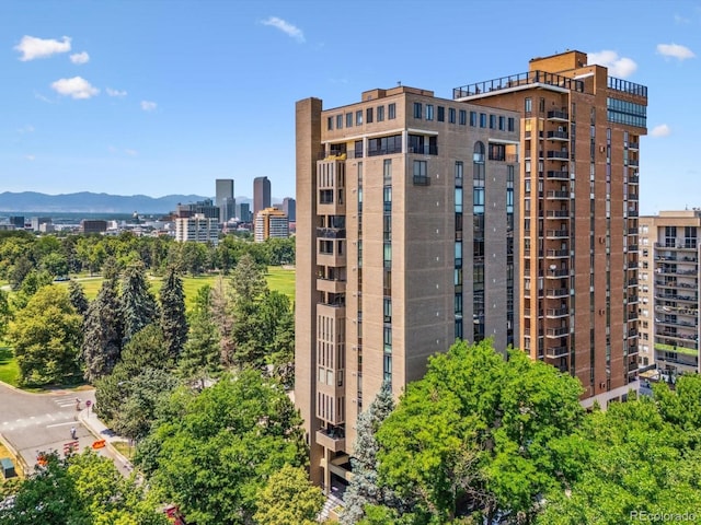 1111 Race St Unit 3A, Denver, CO 80206 - view of building exterior with a mountain view and a view of city