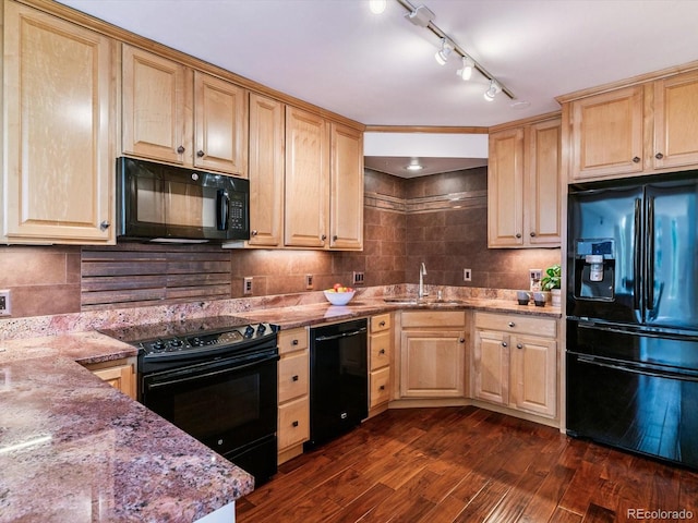 1111 Race St Unit 3A, Denver, CO 80206 - kitchen with black appliances, light brown cabinets, dark wood finished floors, decorative backsplash, and track lighting