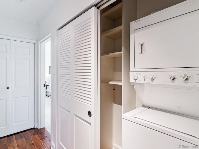1111 Race St Unit 3A, Denver, CO 80206 - laundry room with stacked washer / dryer, crown molding, and dark wood finished floors