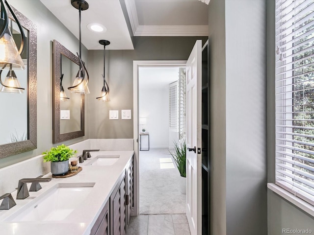 1111 Race St Unit 3A, Denver, CO 80206 - bathroom featuring double vanity, ornamental molding, and tile patterned floors