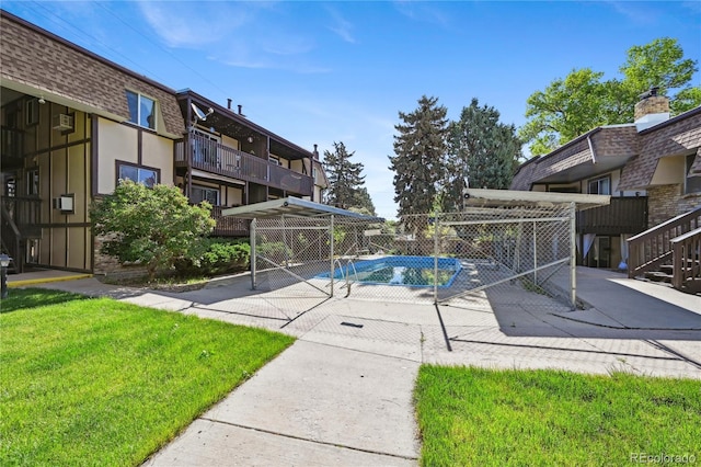 1390 Everett Ct Unit 105, Lakewood, CO 80215 - community pool featuring a patio area