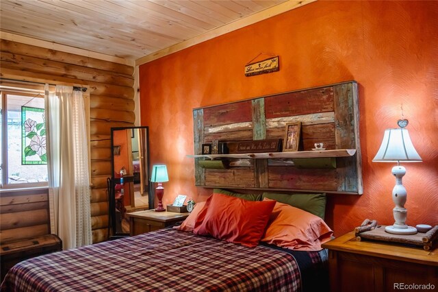 361 Crystal Peak Rd, Florissant, CO 80816 - bedroom with wooden ceiling and log walls