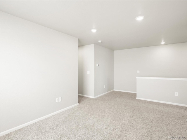 764 N Tempe St, Aurora, CO 80018 - carpeted empty room with baseboards and recessed lighting